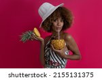 Happy woman on vacation and summer actitud , modelo african american curly hair with tropical outfit