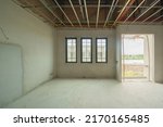 Small photo of Empty under construction room in home or house with space on site. Interior. Old unfurnished room rental property, living space units. lifestyle. Renovation.