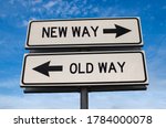 New way versus old way road sign. White two street signs with arrow on metal pole with word. Directional road. Crossroads Road Sign, Two Arrow. Blue sky background. Two way road sign with text.