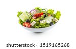 Small photo of Salad with fresh vegetables olives tomatoes red onion greek cheese feta and olive oil isolated on white background.