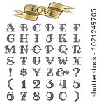 set of tattoo style letters and ... | Shutterstock .eps vector #1021249705