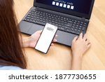 Small photo of Woman hand enter a one time password for the validation process, Mobile OTP secure Verification Method, 2-Step authentication web page.