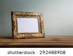 Vintage photo frame on wooden...