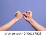 Small photo of Pinky promise hands gesturing. Concept of reconciliation of friends or lovers.