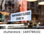 Store sign, temporarily closed. Coronavirus sign in a store.