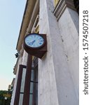 Small photo of Clock on the railway station. Train Station Clock. Old vintage timetable. Made by the famous Jean Paul Garnier in the 19th century. Herculean Baths, Romania, November 25, 2019