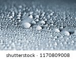 macro dew drop on floor. water drop close up.crystal macro.light on dew drop.blur background.