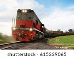 Small photo of Freight train locomotive carrying with cargo on daylight