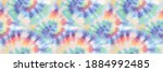 spiral tie dye swirl. rainbow... | Shutterstock .eps vector #1884992485