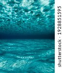 Small photo of Underwater background with ripples and ripples in blue underwater