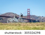 Two Bicycles Parked On Grass In ...