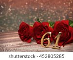 Small photo of birthday concept with red roses on wooden desk. sixty-first . 61st. 3D render