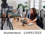 Woman recording content for her lifestyle blog vlog, modern businesswoman using social media for marketing