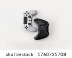Black and White Game Controllers on white background