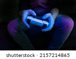 Man holding a game controller.