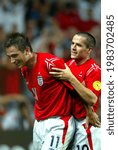 Small photo of LISBON, PORTUGAL - JUNE 21, 2004: Frank Lampard of England celebrates his goal with Michael Owen during the UEFA Euro 2004 Croatia vs England at the Estadio da Luz.