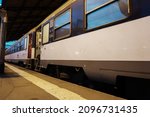 Small photo of Rodez, France - May 2021 - Railcars of an Alstom night, sleeper train on the Rodez-Paris Intercites line run by SNCF, at the platform in the railway station in the evening, waiting for the departure