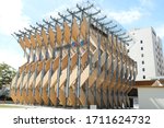 Small photo of Harumi, Tokyo, Japan - April 22 2020: CLT Park Harumi, a structure made with Cross Laminated Timber and emblazoned with a"Grow With Google" sign.