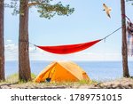 Tent and hammock on the beach. Tented tourist camp