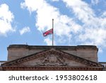 Small photo of London, UK - April 10, 2021: Buckingham Palace Union Flag flying at half-mast, tribute to Prince Philip