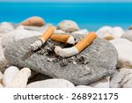 Cigarette Butts On The Beach