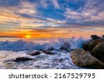 A Sunrise Back Lit Ocean Wave Is Breaking On The Beach Shore In High Resolution Image Format