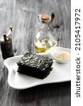 Small photo of Delicious Toasted Nori Laver Seasoned Seaweed and Sesame Snacks, Popular in Japan and Korea