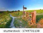 Wooden Sign And Gateway On A...