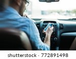 Man using phone while driving...