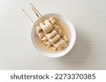 Small photo of Odeng - Korean fish cake skewer in soup - Korean street food style