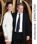 Small photo of London, United Kingdom - November 28, 2023: Anna Elisabet Eberstein and Hugh Grant attend the "Wonka" World Premiere at The Royal Festival Hall in London, England.