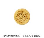 Small photo of Food photography of a plain toasted English or Australian crumpet on a white background