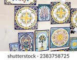 Small photo of August 29, 2023, city of San Felice Circeo, Italy. Colorful Mediterranean ceramics are sold on the streets of San Felice Circeo