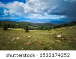 Small photo of Greenhorn mountain range and beautiful Colorado sky.