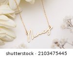 Gold necklace with name...