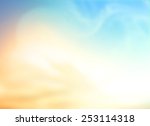 A peaceful day concept: Abstract sunshine sky with blurred beautiful yellow nature background