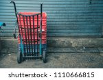 image of sack trolley(curve) parking in dirty market.