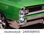 Green retro car with close up...