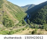 Small photo of River meandres between two mountains landscape