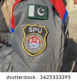 Small photo of Faisalabad, Punjab, Pakistan - 1 22 2020: SPU (Special Protection Unit) Punjab Police in Pakistan With the Pakistan Flag