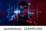 Small photo of businessman finger touch virtual screen, NFT token digital crypto art blockchain technology concept.