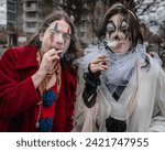 Small photo of Hackney, London, England - February 4, 2024: Clowns smoke and vape in London at the Joseph Grimaldi event.