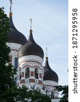 Small photo of Russian Protestant basilica, Church, CluseUp shot with an 400mm from long distance in a park in Tallinn. Old Russion Beautiful church. Temple.