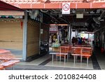 Small photo of SINGAPORE – 19 JUL 2021: Chomp Chomp Food Centre was popular for its variety of local dishes. Covid-19's dine-in restrictions have led to many food stalls shuttered or operating at shorter times.