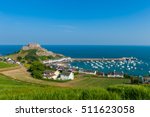 Harbour and Gorey Castle in Saint Martin, Jersey, Channel Islands, UK on summer day.