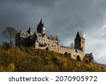 Small photo of Altena in Sauerland Germany with castle “Burg Altena“, a famous landmark monument in the Lenne Valley and Mediaval Sight with First Youth Hostel of the World on a sunny autum day with colorful foliage