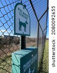 Small photo of DUBUQUE, IOWA, November 24, 2021–Closeup photo of pet waste station in Dubuque County Humane Society Dog Park on sunny Fall day.