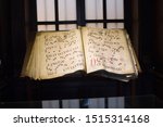 Small photo of LIMA, PERU - JUNE 24, 2017: Old Gregorian chant book in front of a window on display at Basilica and Convent of Santo Domingo - Imagem