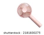 Small photo of Mini electric pink fan with handle, isolated on white background. Concept : Portable electrical equipment that very useful when hot weather.