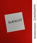 Small photo of paper note with the word Blacklist